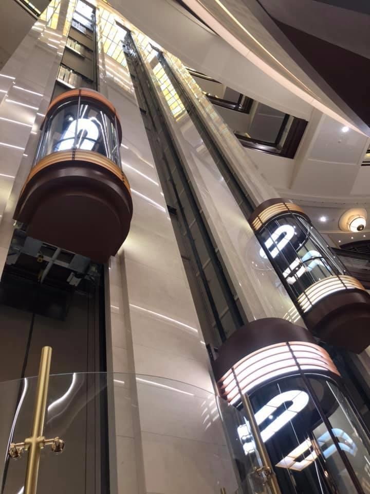 Glass capsule elevator in a premium building